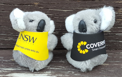 Clip-on koala toys in colored jackets 